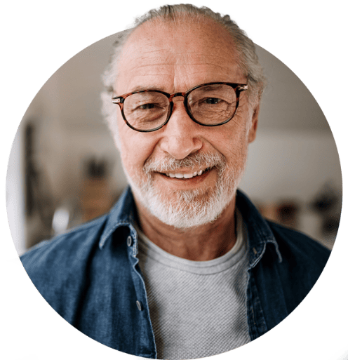 Elderly man smiling at camera