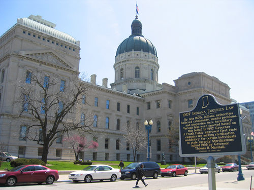 The installed marker with the Statehouse in the background.