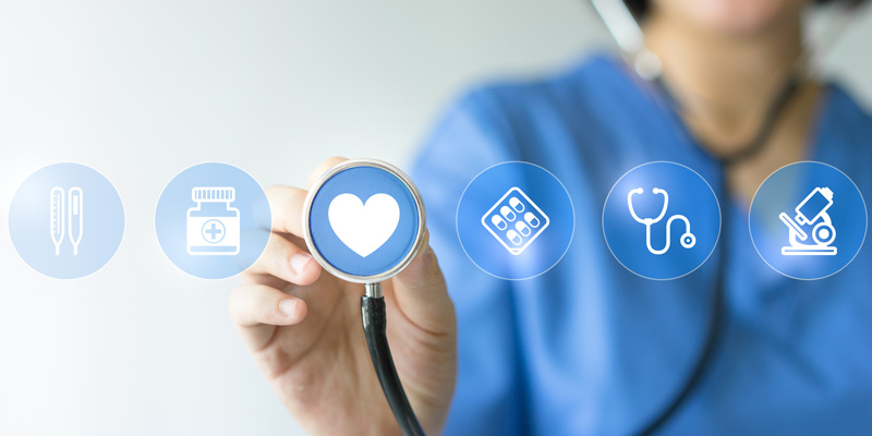 woman holding stethoscope