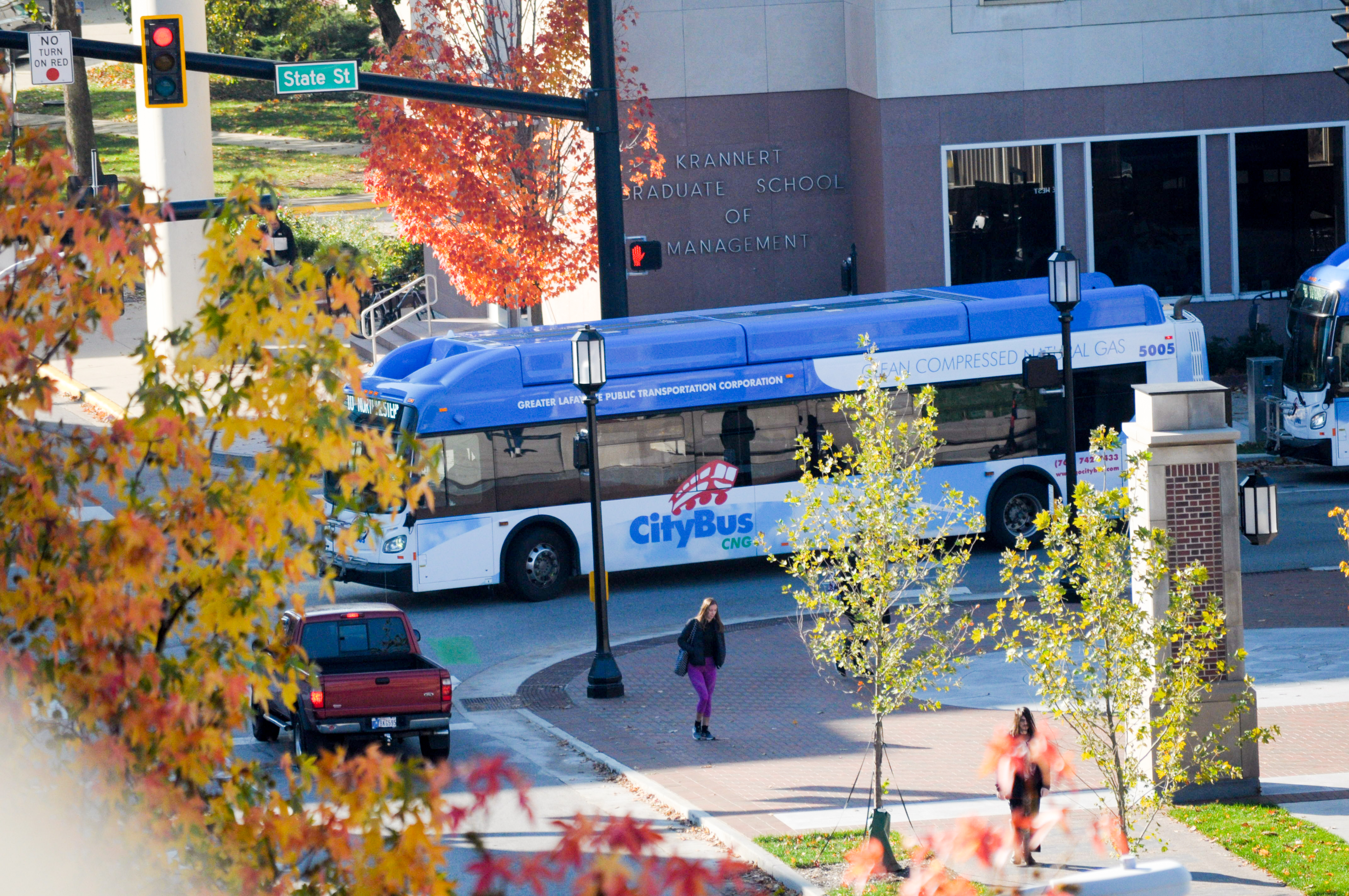 bus at intersection in fall