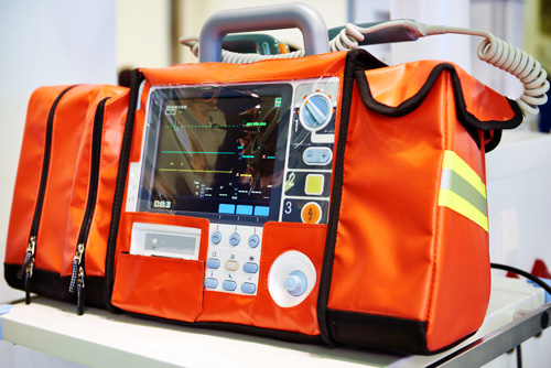 Portable defibrillator and monitor