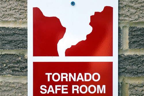 Tornado safe room sign on wall