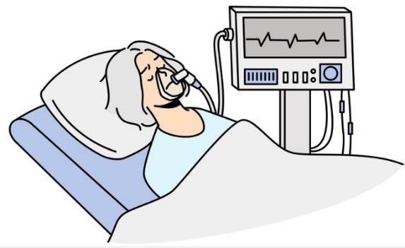 A person lies in a hospital bed with a breathing machine hooked up.