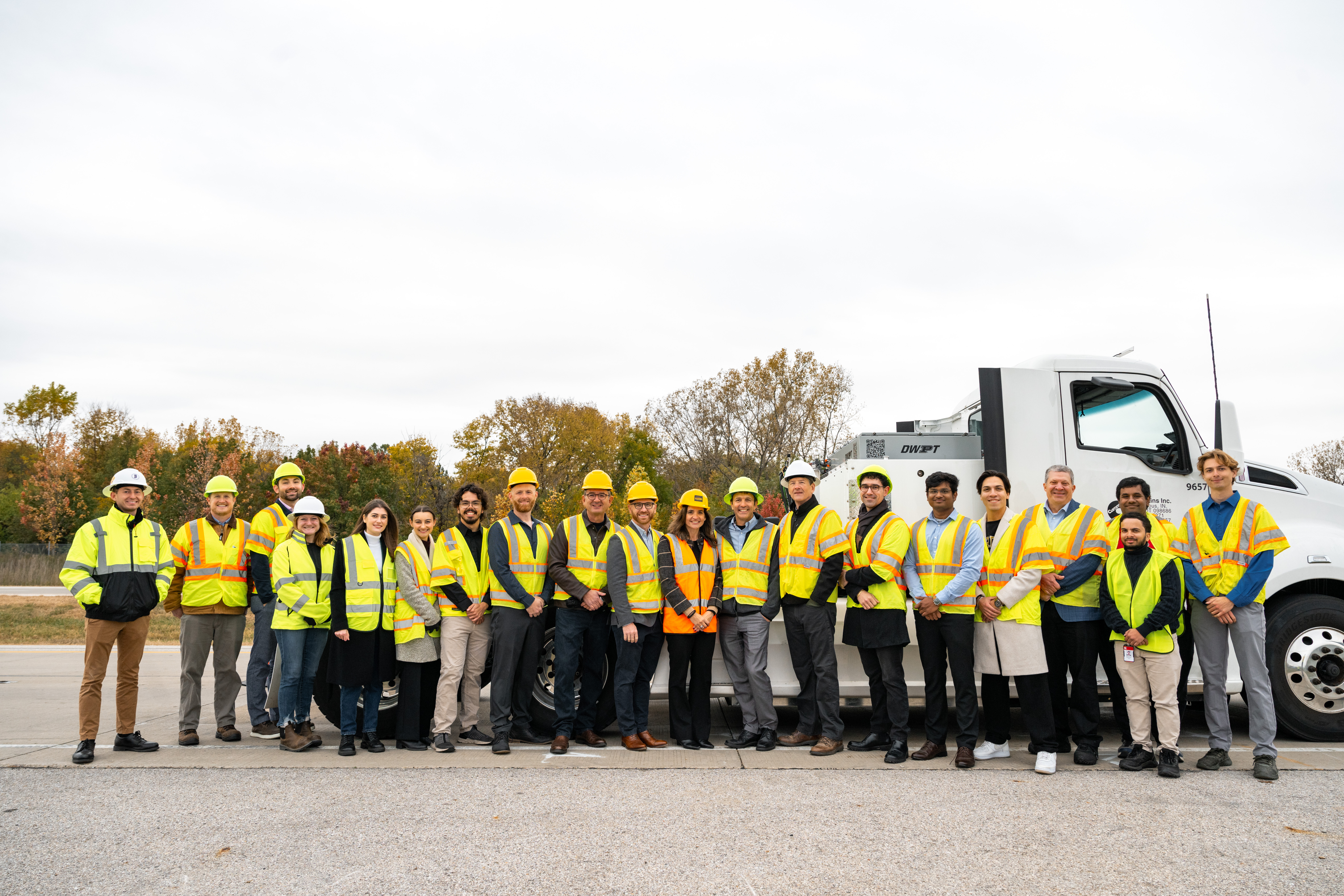 Dynamic Wireless Power Transfer team lined up in a row in their PPE.