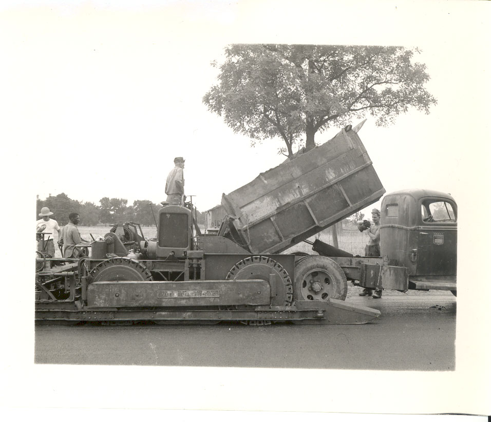 Dumptruck with a spreader