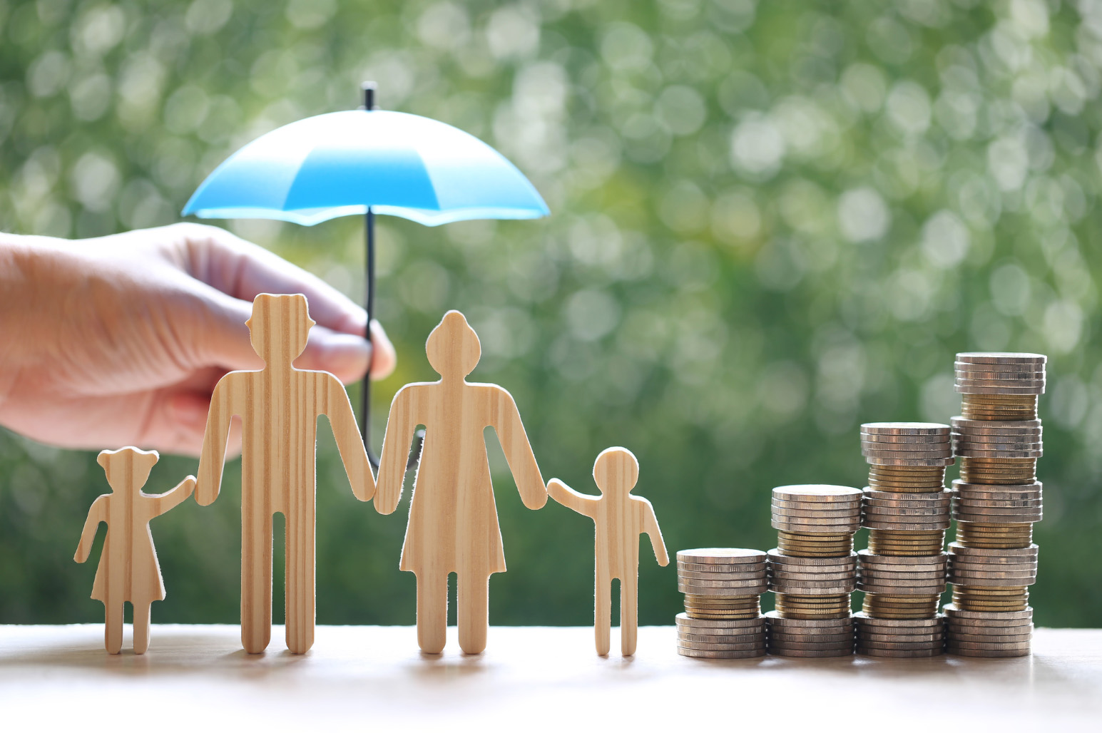 Illustration showing a family with stacks of coins next to them.